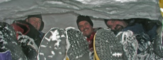 Men in snow cave